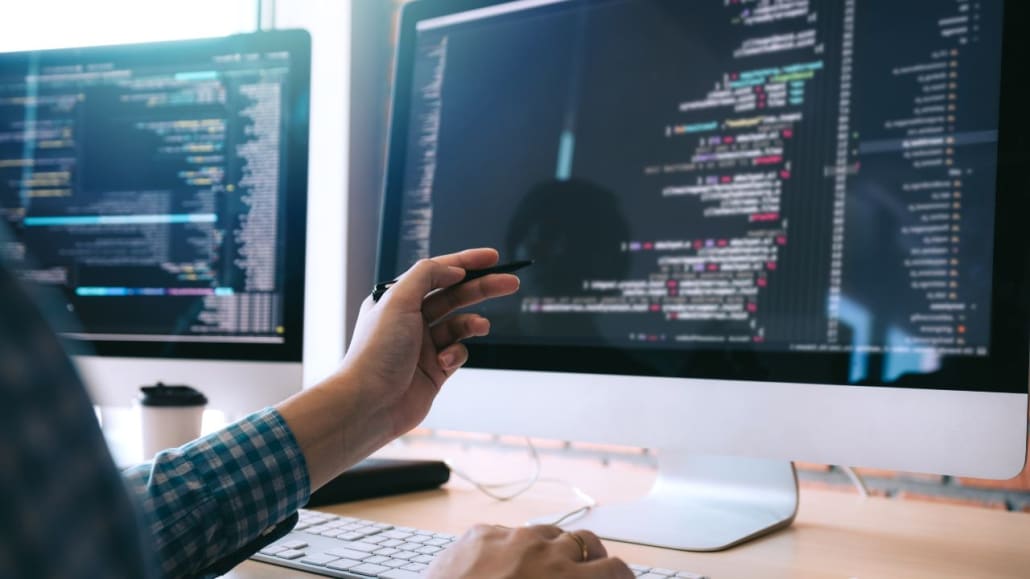 developer looking for bugs in code